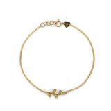 Flora bracelet in gold chain with branch and diamonds