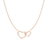 Necklace with intertwined hearts in gold and diamonds